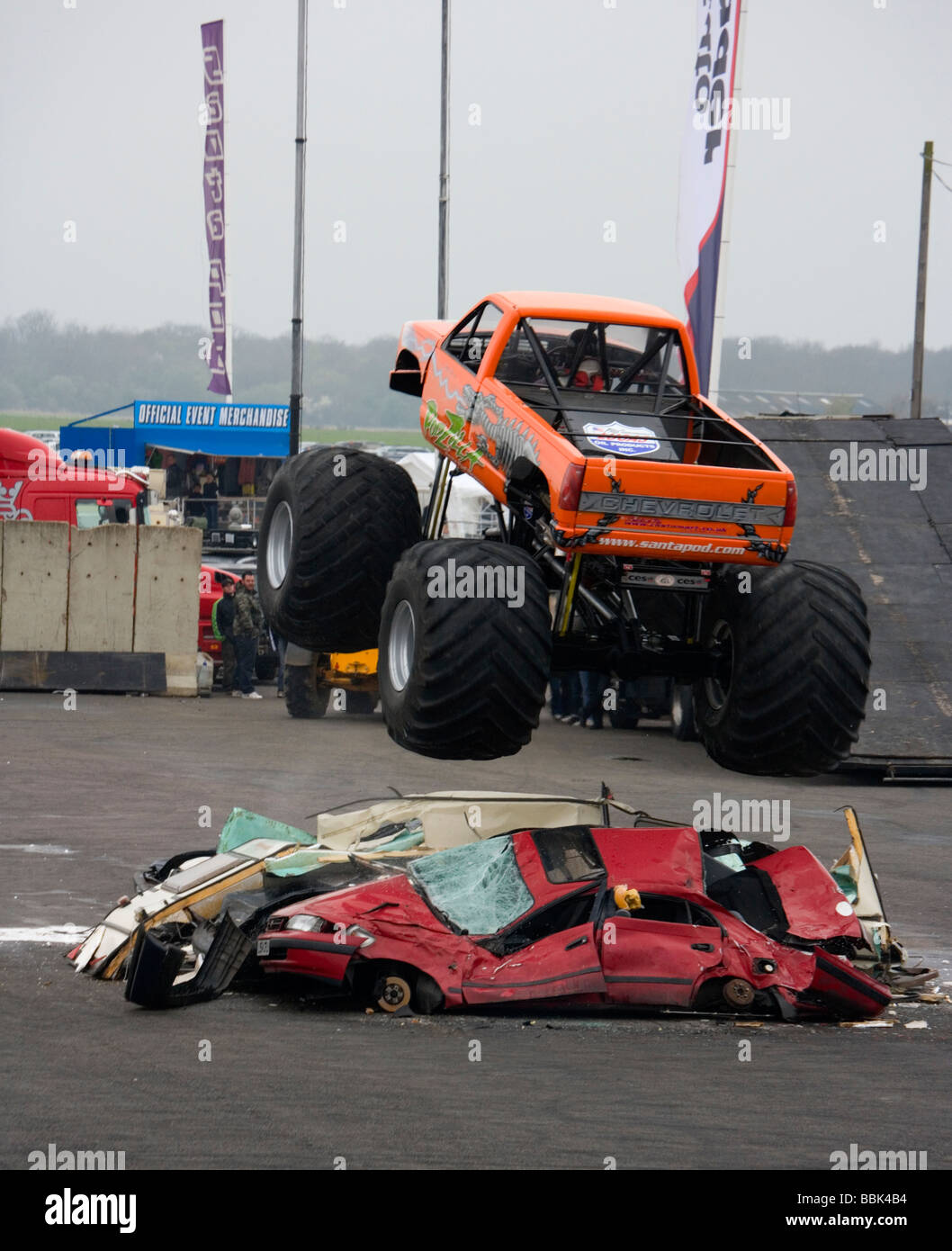 Monster Truck Podzilla Jumping over cars at the Easter Thunderball event in Santa Pod, England. Stock Photo