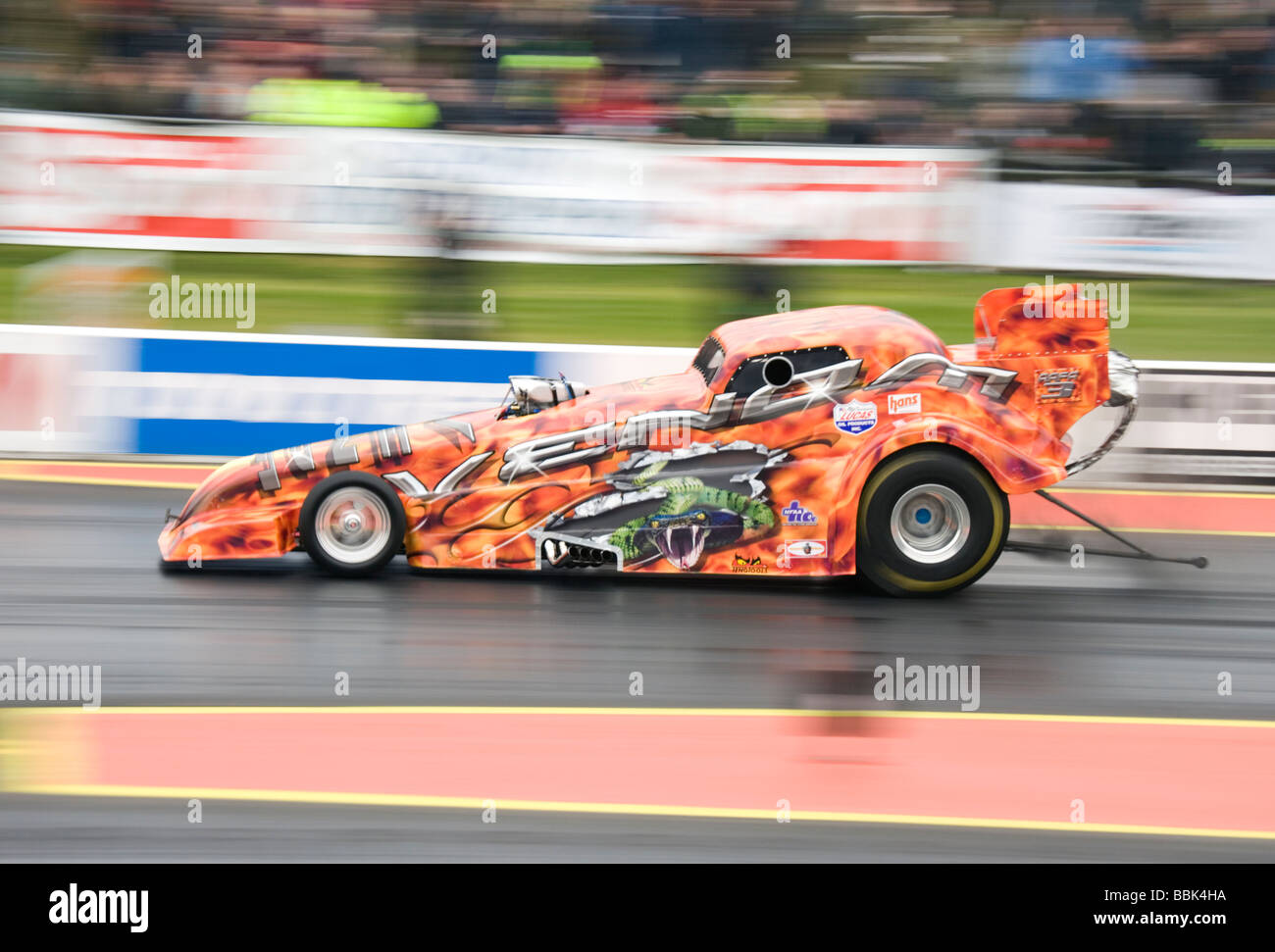 Top Fuel dragster Venom driven by Tony Betts at the Easter Thunderball event in Santa Pod, England Stock Photo