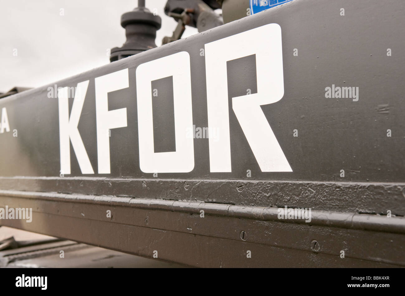 KFOR (Kosovo Force) on the side of a British Army Sabre tank Stock Photo