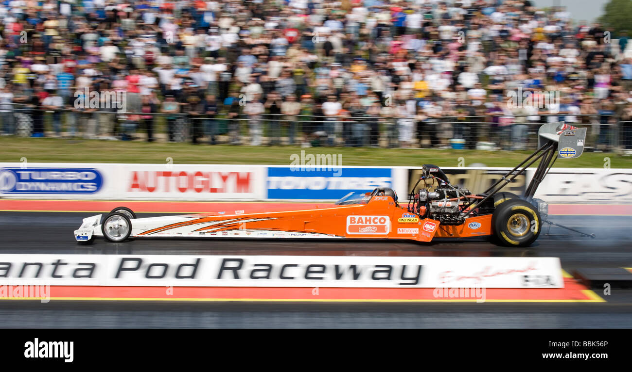 Top fuel dragster driven by Mikael Kagered at the FIA European Drag Racing Championship at Santa Pod, England. Stock Photo