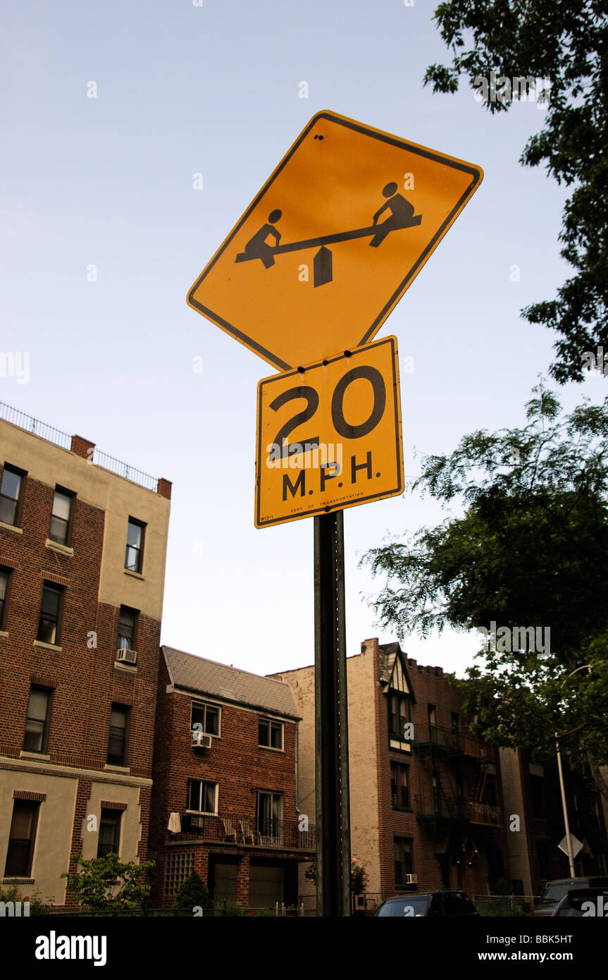 20 mph road sign within a childrens play area zone Stock Photo