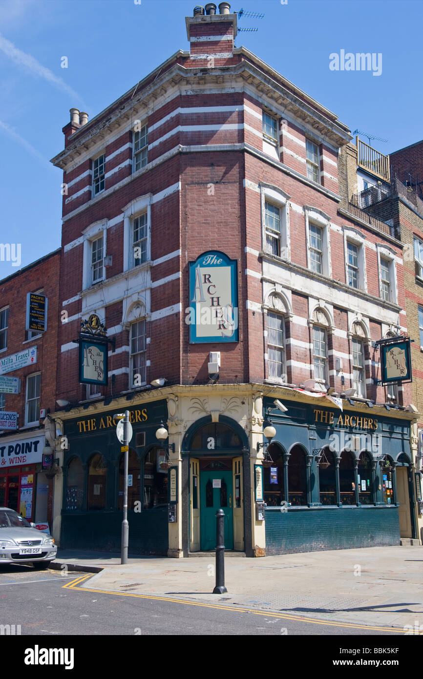 Brick Lane , Shoreditch , East End , The Archers typical old English public house surrounded by Indian & Bangladeshi businesses Stock Photo