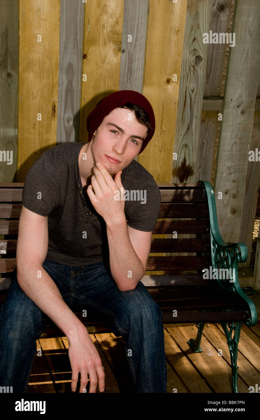 Handsome serene young man in deep thought. Stock Photo