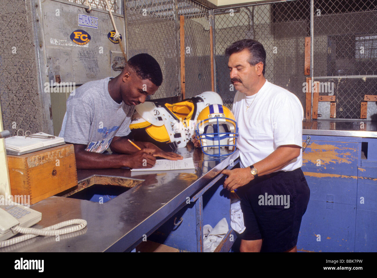 gym sport equipment manager checkout inventory Stock Photo Alamy