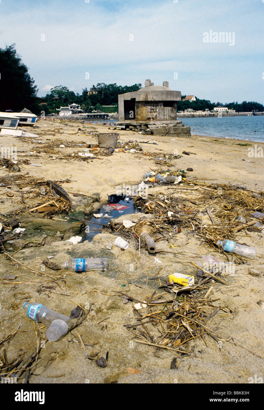 Trash and debris on Gulangyu island beach at Xiamen in Fujian province Stock Photo