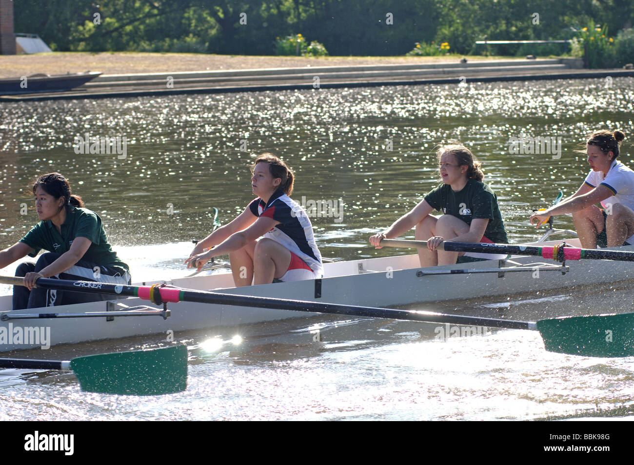 Female students rowing on River Thames, Oxford, Oxfordshire, England