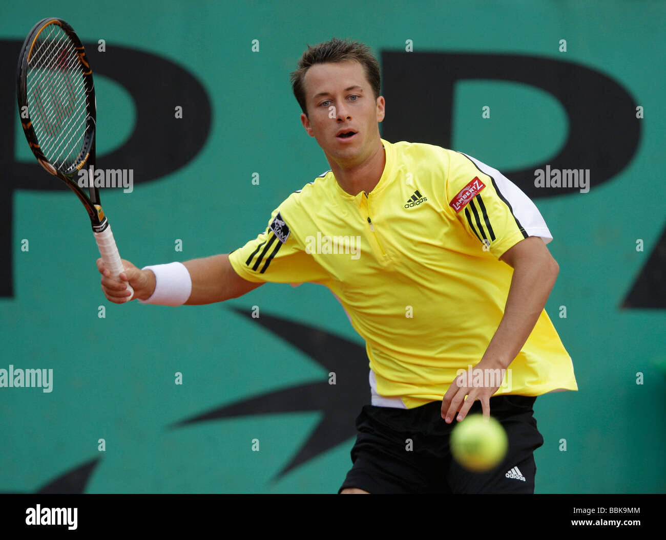 German player Philipp Kohlschreiber plays forehand return at Roland Garros Stock Photo