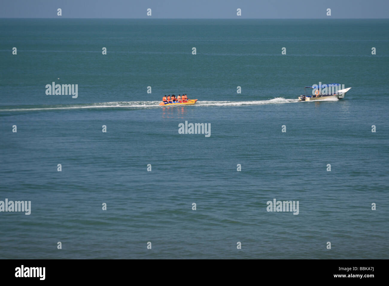 A group of visitors enjoying the water sport at Port Dickson beach