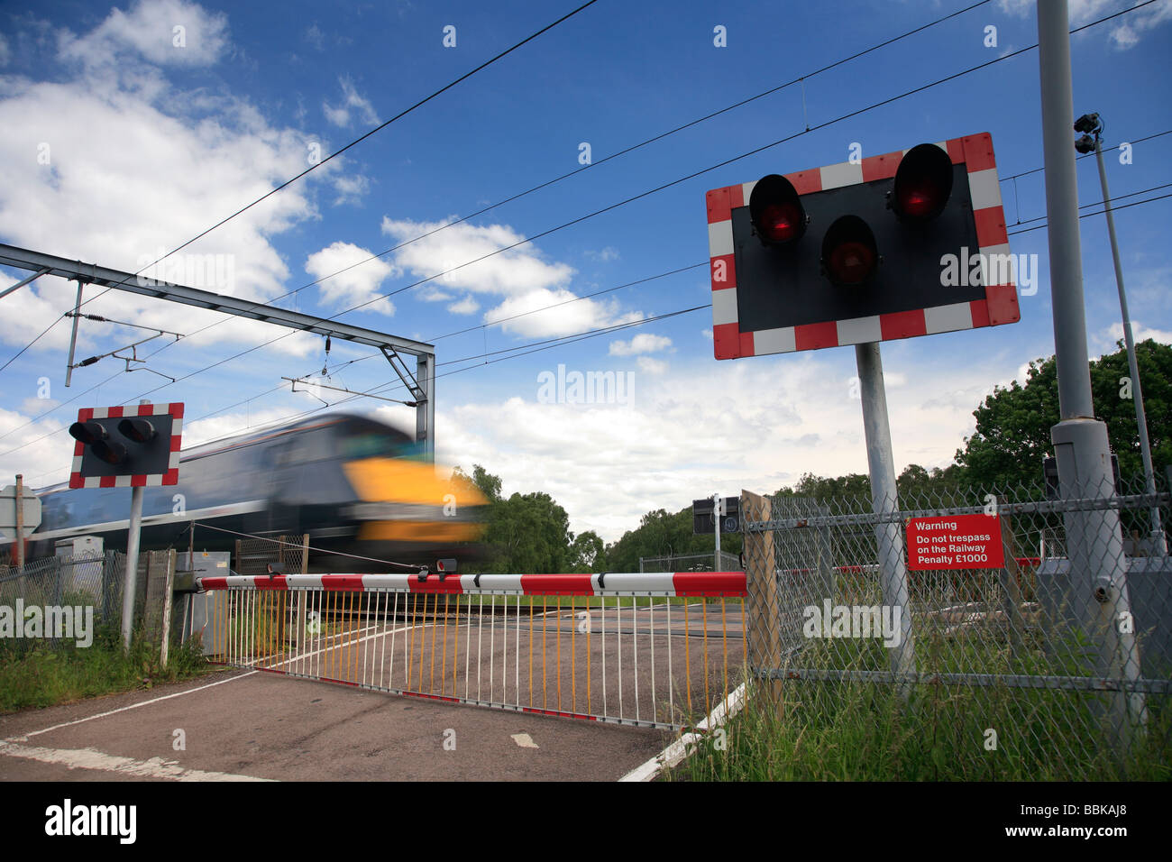 Speeding National Express Train Passing A Level Crossing East Coast Main Line Railway Peterborough Cambridgeshire England Uk Stock Photo Alamy Speeding National Express Train Passing A Level Crossing East Coast Main Line Railway Peterborough Cambridgeshire England Uk Stock Photo Alamy