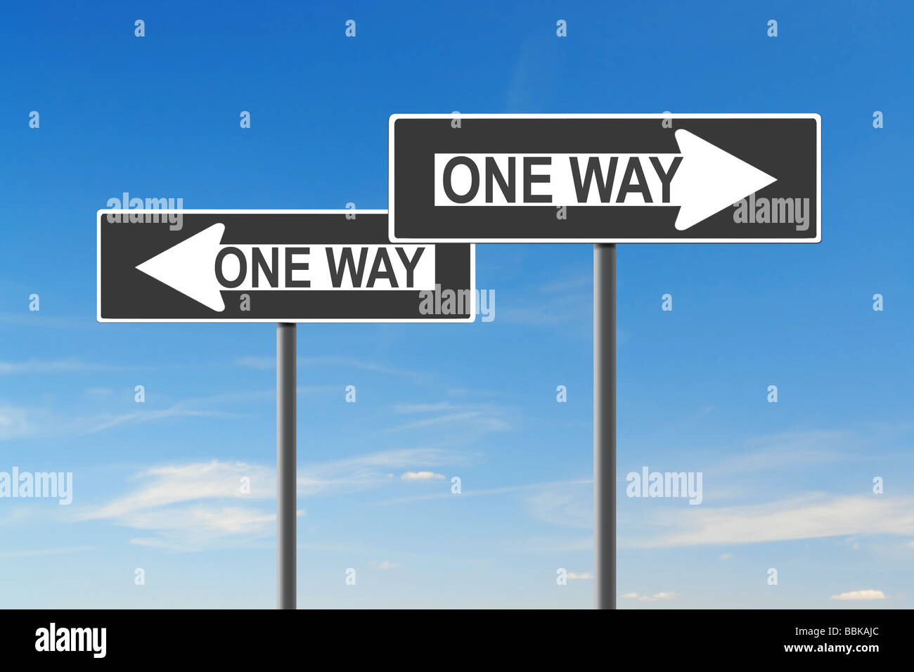Two One Way roadsigns indicating opposite directions over blue sky - confusion concept Stock Photo