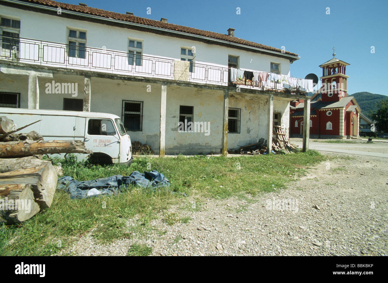Living house with clothesline and orthodox church in Mojkovac, northern Montenegro, Balkans Stock Photo