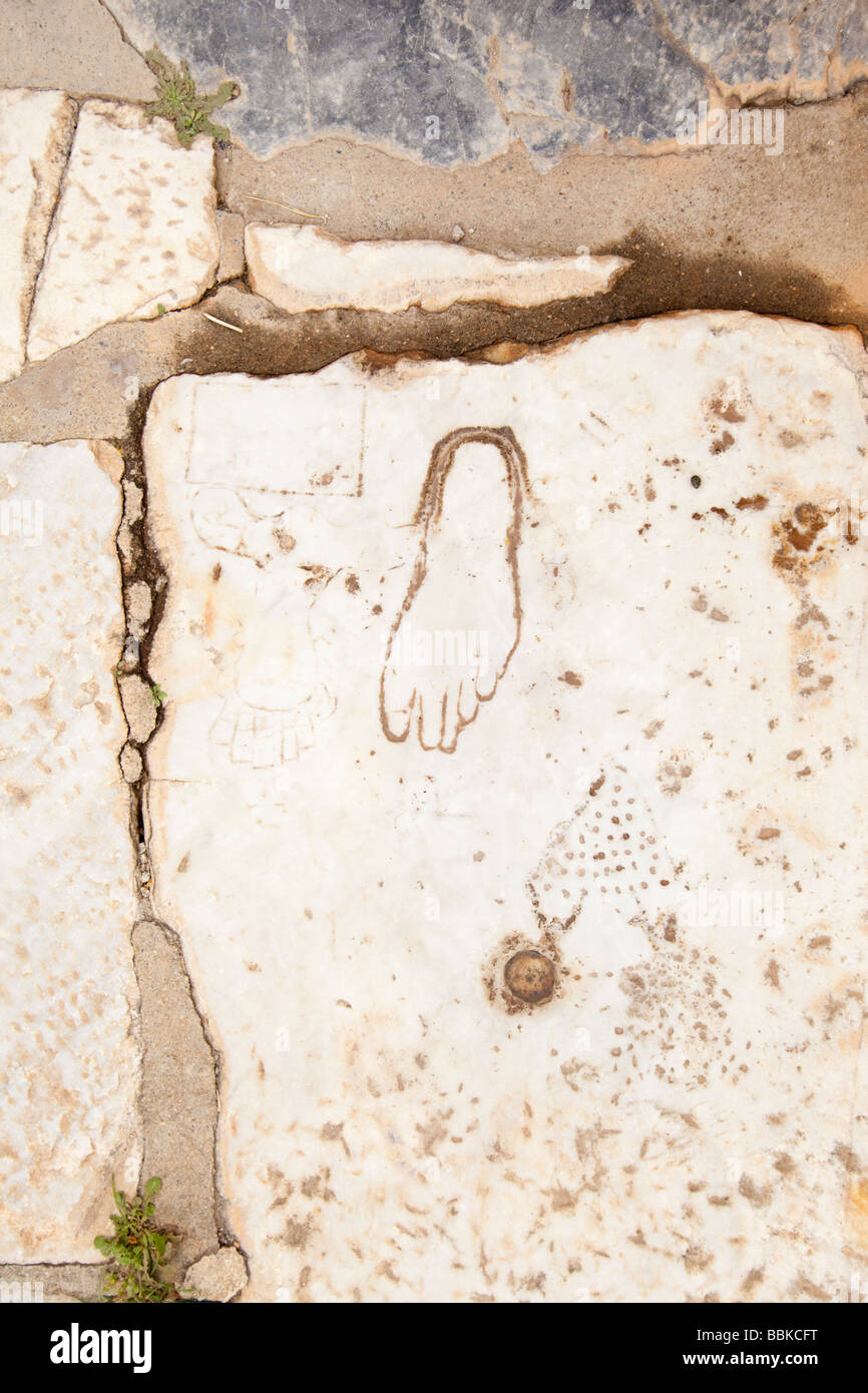 Ancient advertisement at Ephesus in Turkey promoting a local brothel ...