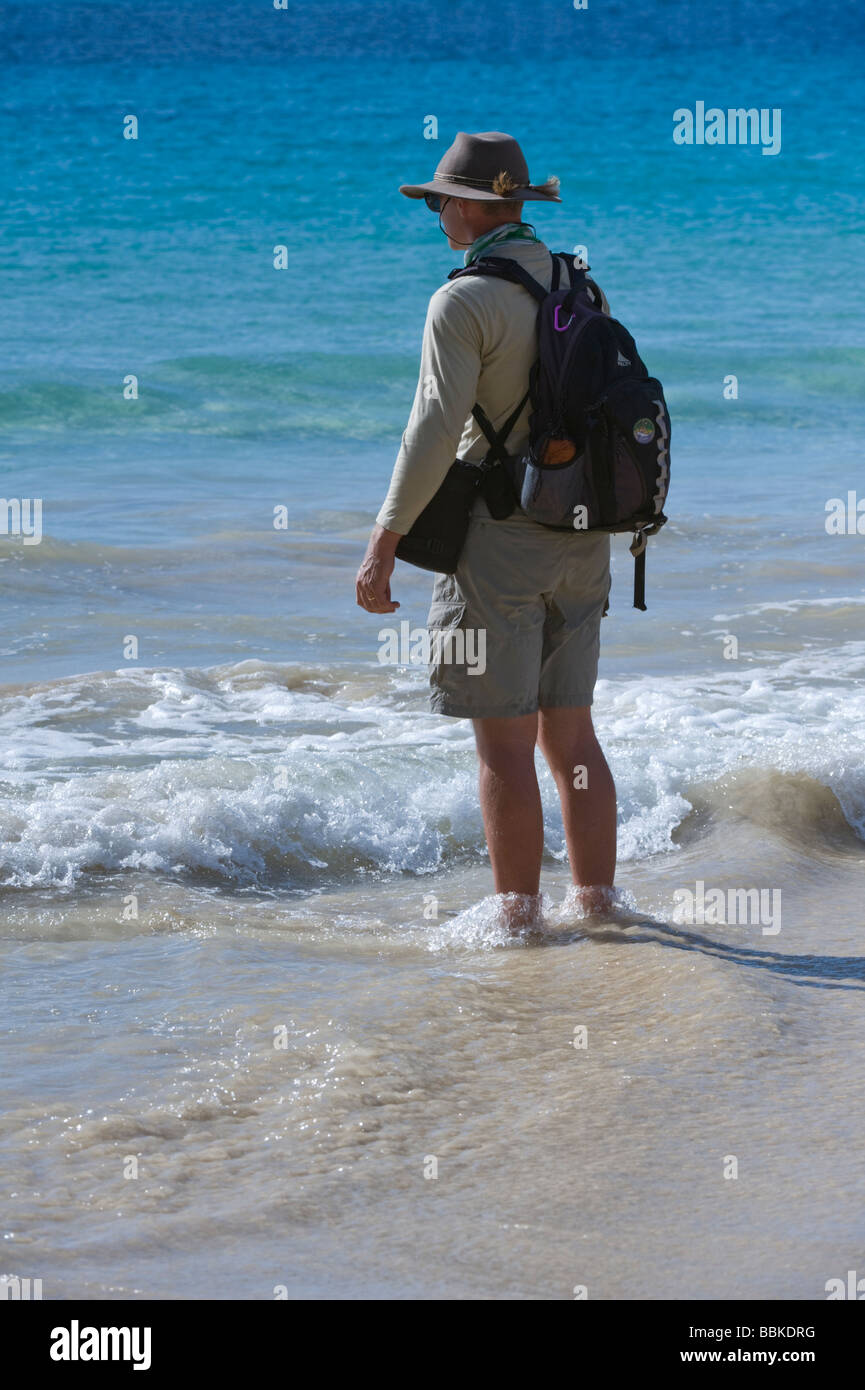 David Fitter standing in water Punta Cormoran Cormorant Floreana Galapagos Ecuador Pacific Ocean South America Stock Photo