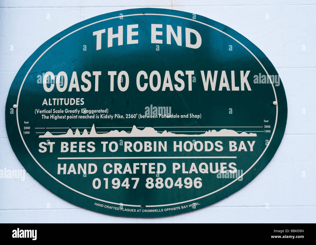 Plaque on wall of Bay Hotel in Robin Hoods Bay marking the end of the coast to coast walk Stock Photo