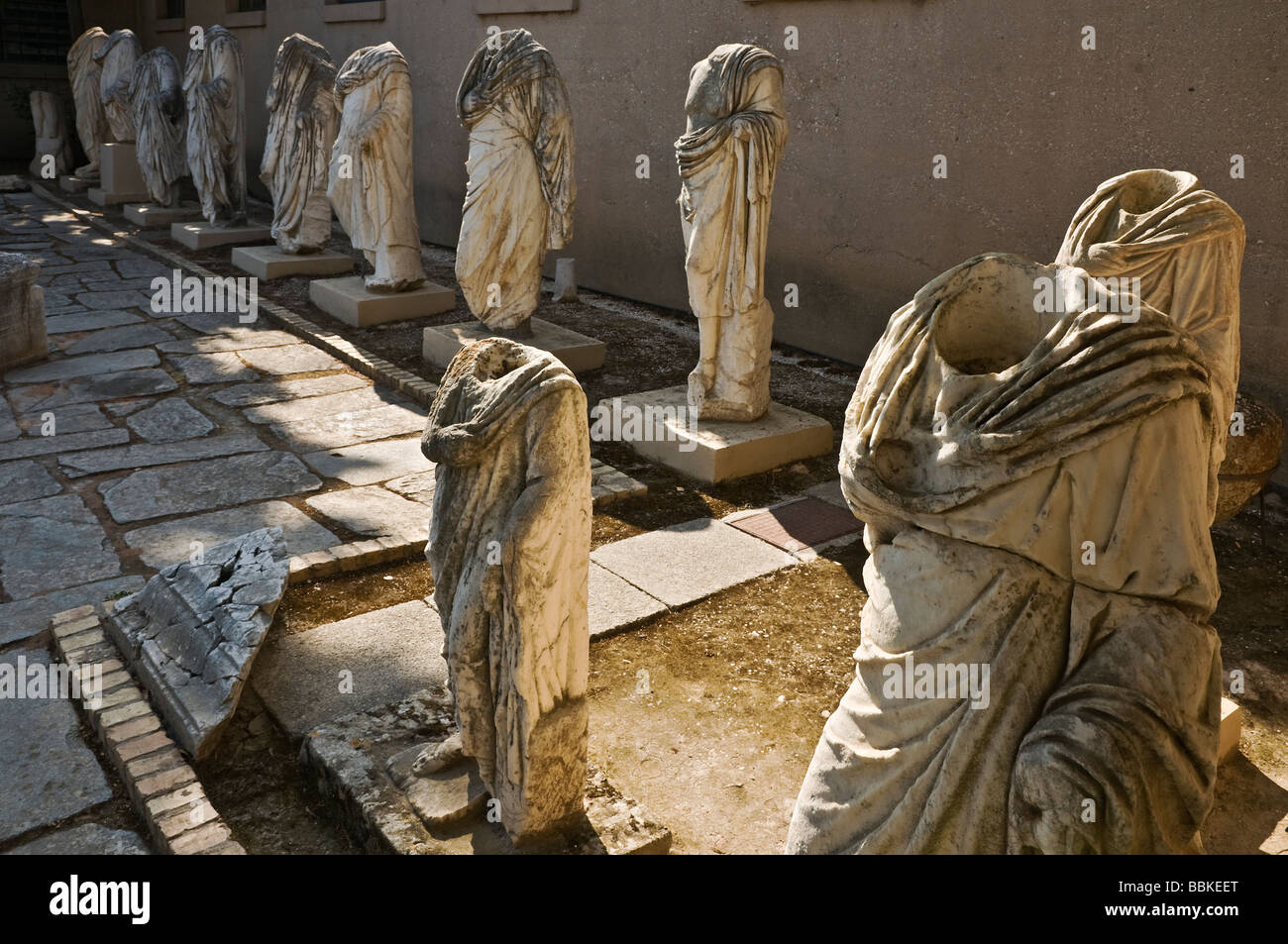 A display of headless statues in the musem courtyard at Ancient Corinth