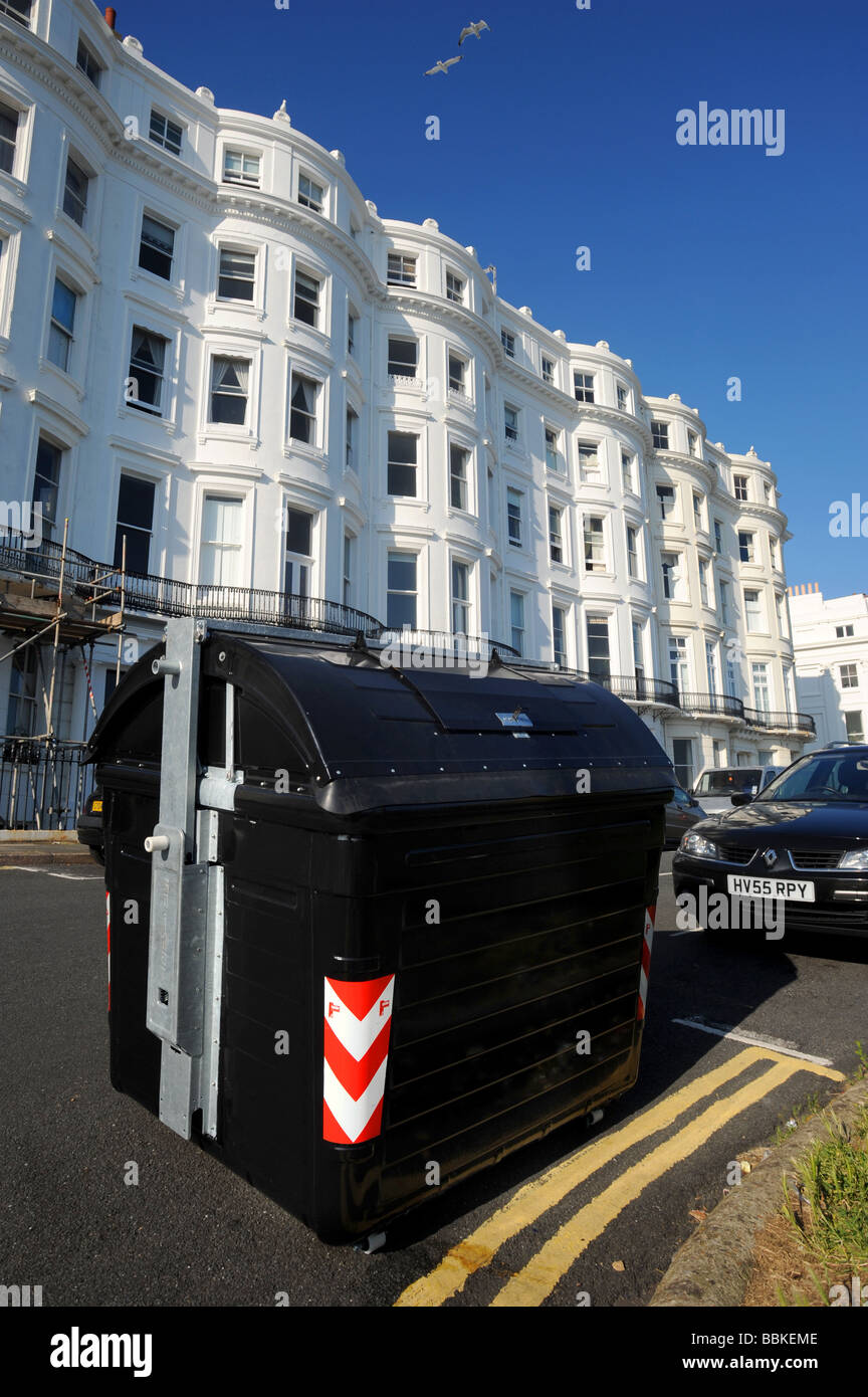 One of the newly installed communal bins in Brighton's Kemp Town area Stock Photo