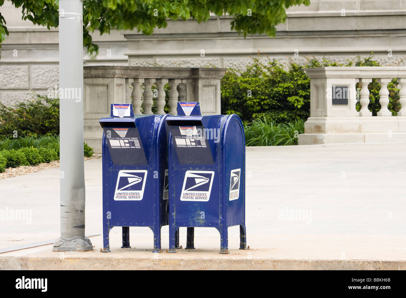 Two United States Postal Service mailboxes in front of Linn County Courthouse, Cedar Rapids, Iowa, USA Stock Photo