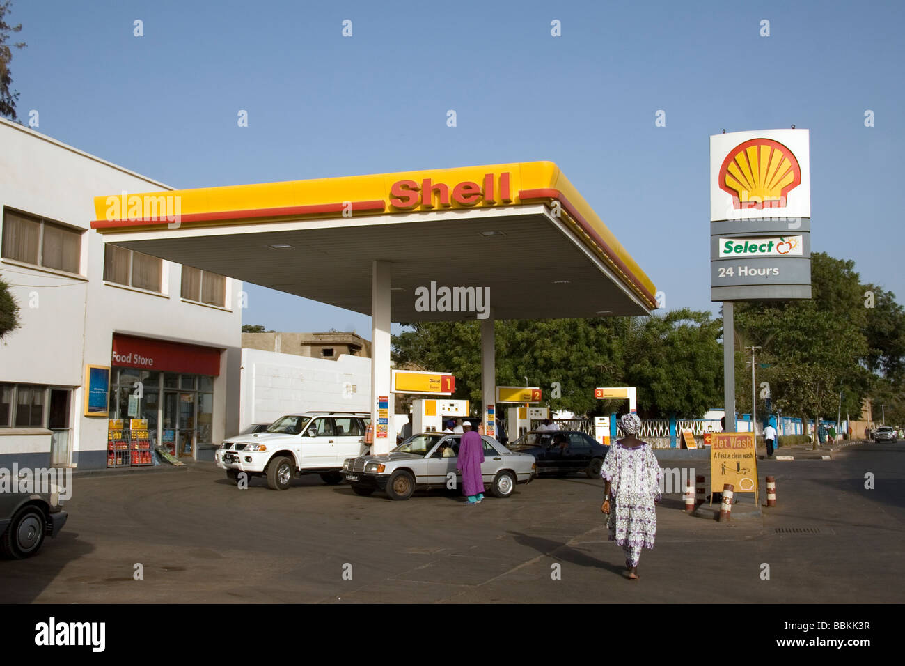 Cars filling up with fuel at Shell petrol station Banjul Gambia West Africa Stock Photo