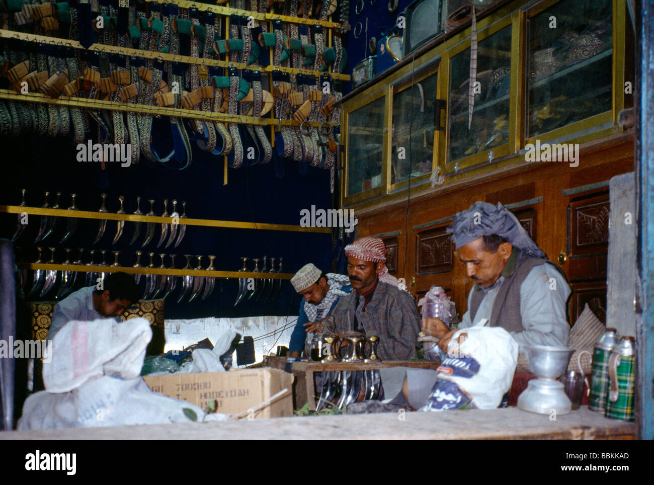 Sanaa Yemen Men Making Jambias In Shop Man Chewing Qat Stock Photo
