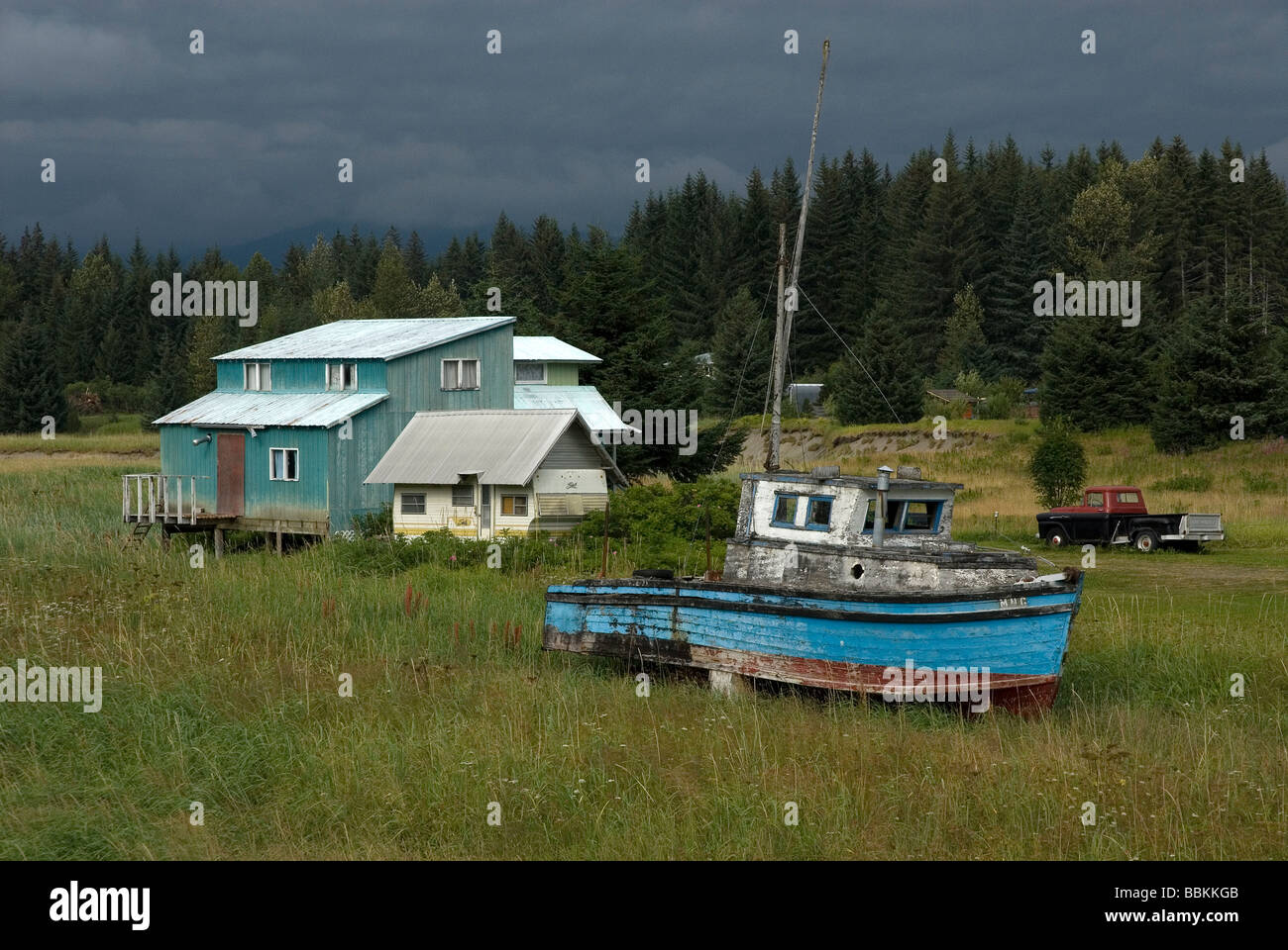 Old boat in someones yard in Gustavus Alaska USA Stock Photo