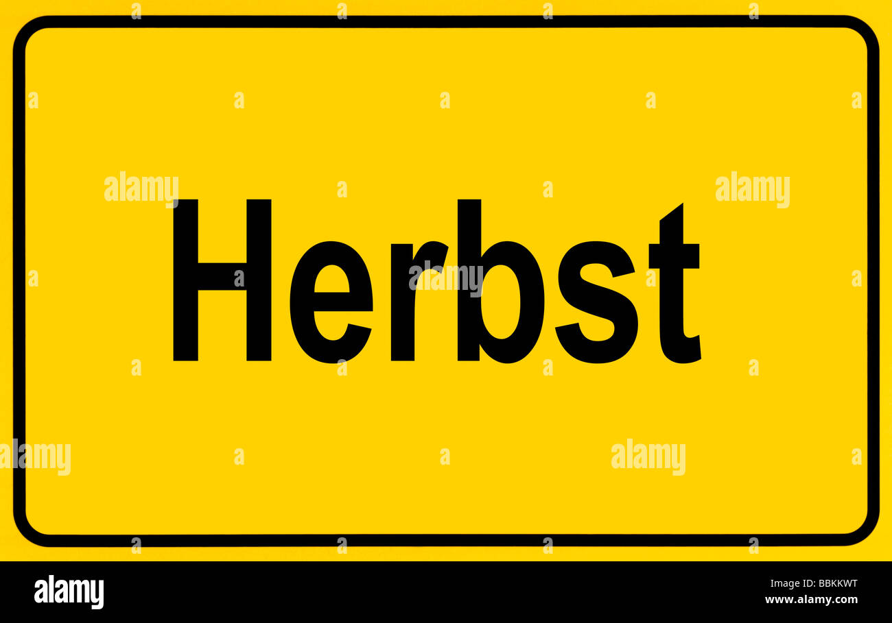 Town sign, German lettering Herbst, symbolic of beginning of autumn Stock Photo