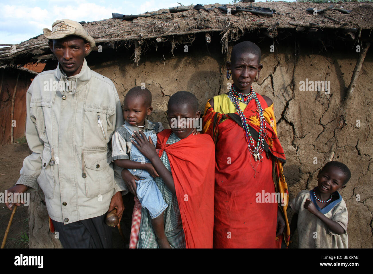 Ngoiroro is a village of 200 inhabitants all belonging to the Massai Tribe The village lays right in the rift valley south of Nairobi against the tanzanian border The Massai live very close to nature and their animals The cows and goats are more important then money to the massai Each family owns around 50 cows and 50 goats The main diet of the villagers is meat and milk The women are suppose to milk the cows twice a day and the small boys have to look after the herd during the day while grazing Stock Photo