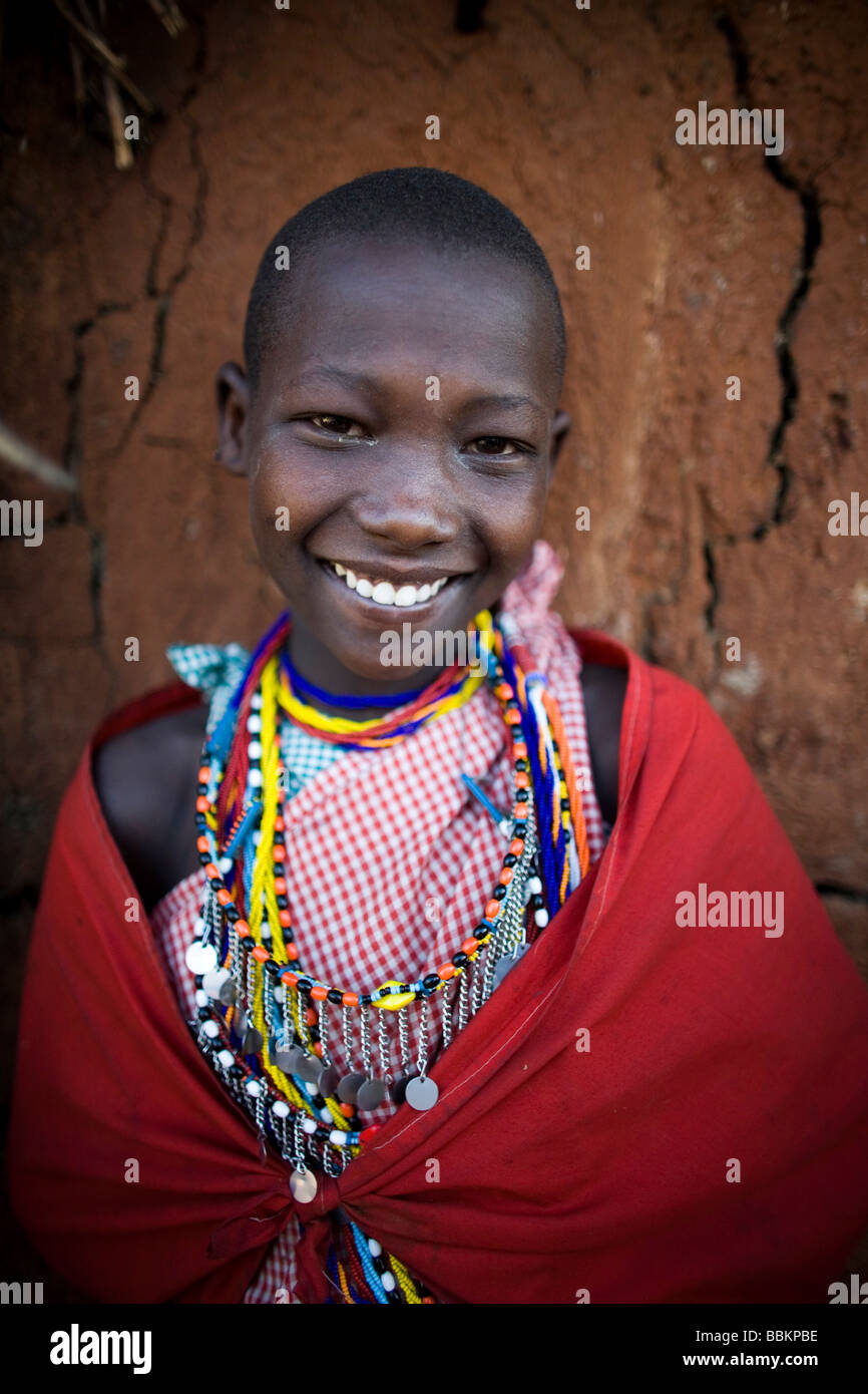 Ngoiroro is a village of 200 inhabitants all belonging to the Massai Tribe The village lays right in the rift valley south of Nairobi against the tanzanian border The Massai live very close to nature and their animals The cows and goats are more important then money to the massai Each family owns around 50 cows and 50 goats The main diet of the villagers is meat and milk The women are suppose to milk the cows twice a day and the small boys have to look after the herd during the day while grazing Stock Photo