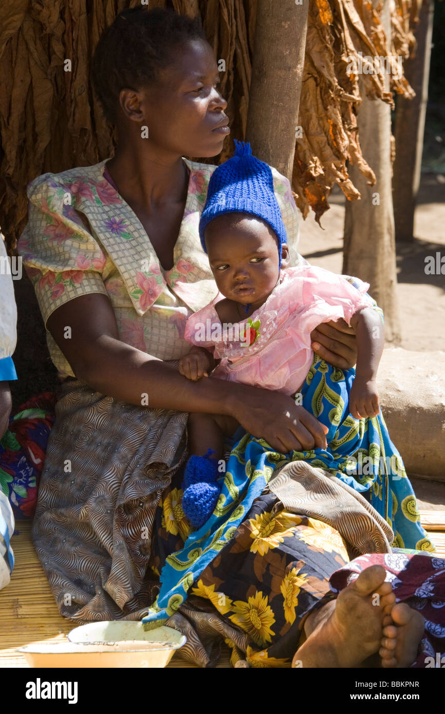 Mother and baby girl in the village of Nyombe, Malawi, Africa Stock ...