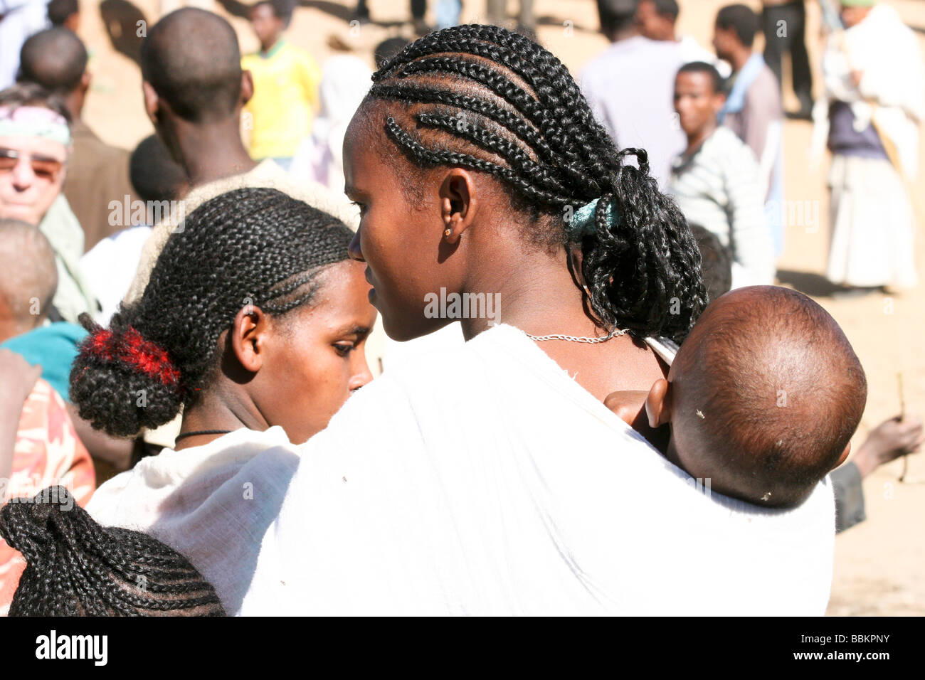 Africa Ethiopia Lalibela woman with Plaited hair and baby on back Stock Photo