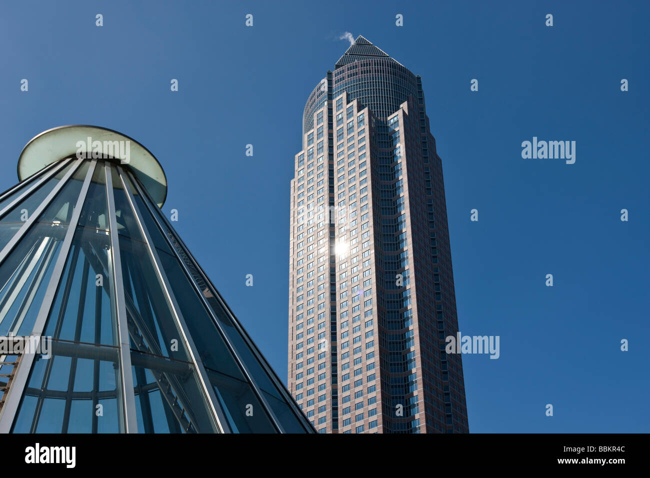 Entrance to the subway station in front of the Messeturm tower, Friedrich-Ebert-Anlage street, Frankfurt am Main, Hesse, German Stock Photo