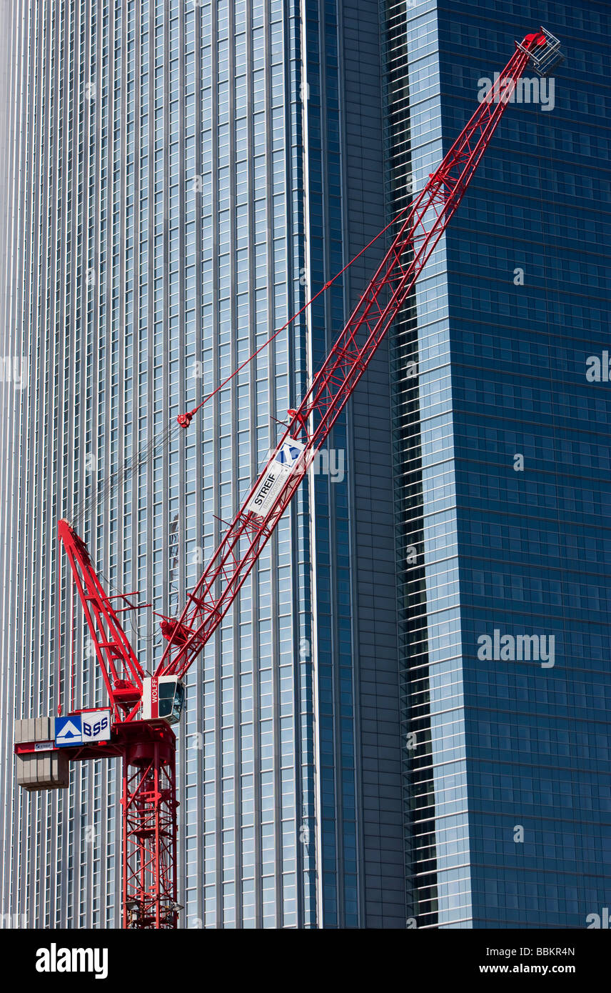 Building crane in front of the Pollux Hochhaus skyscraper, Friedrich-Ebert-Anlage street, Frankfurt am Main, Hesse, Germany, Eu Stock Photo