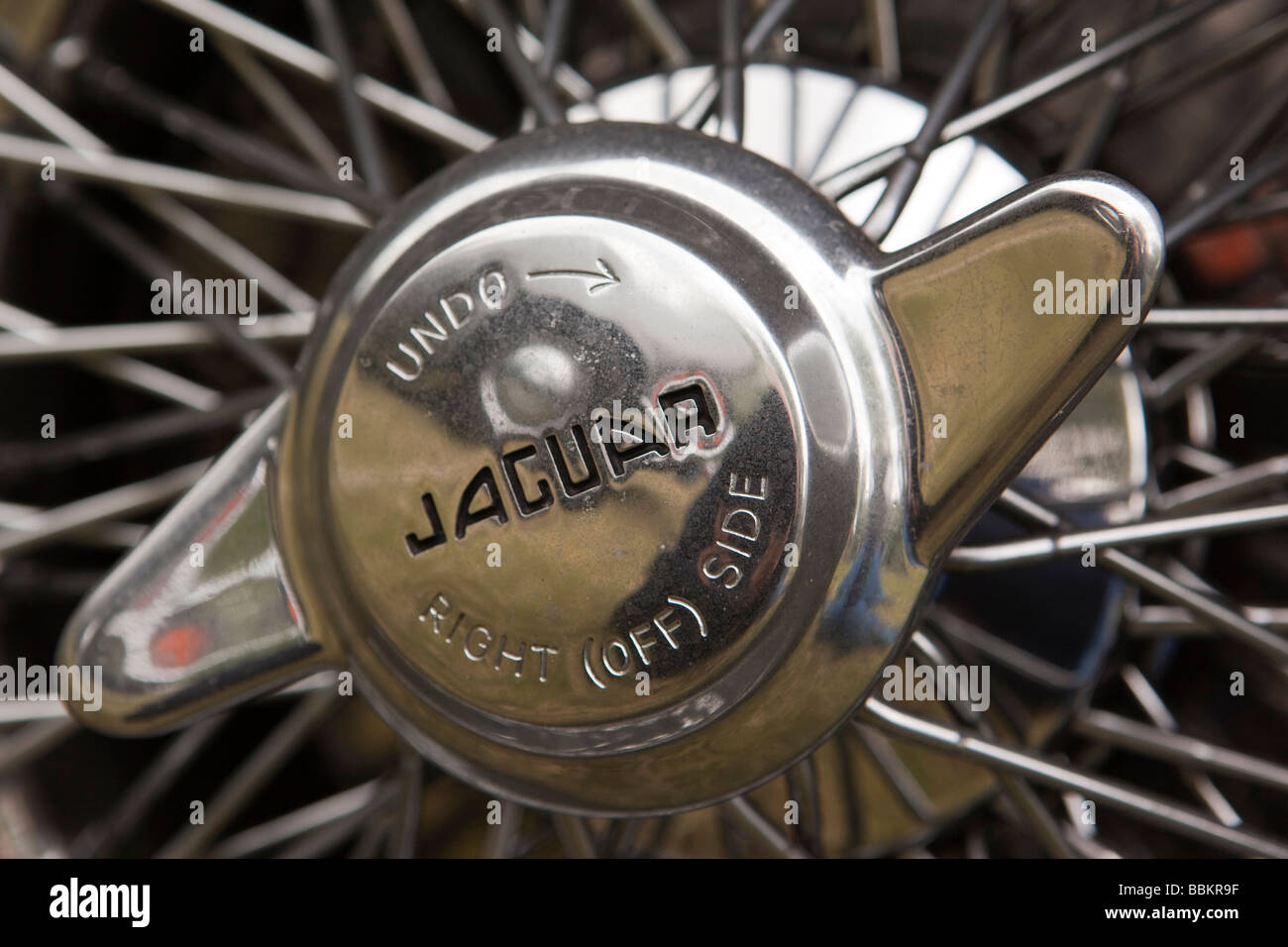 Motoring wheel spinner of classic old British made 1960s E type Jaguar car Stock Photo