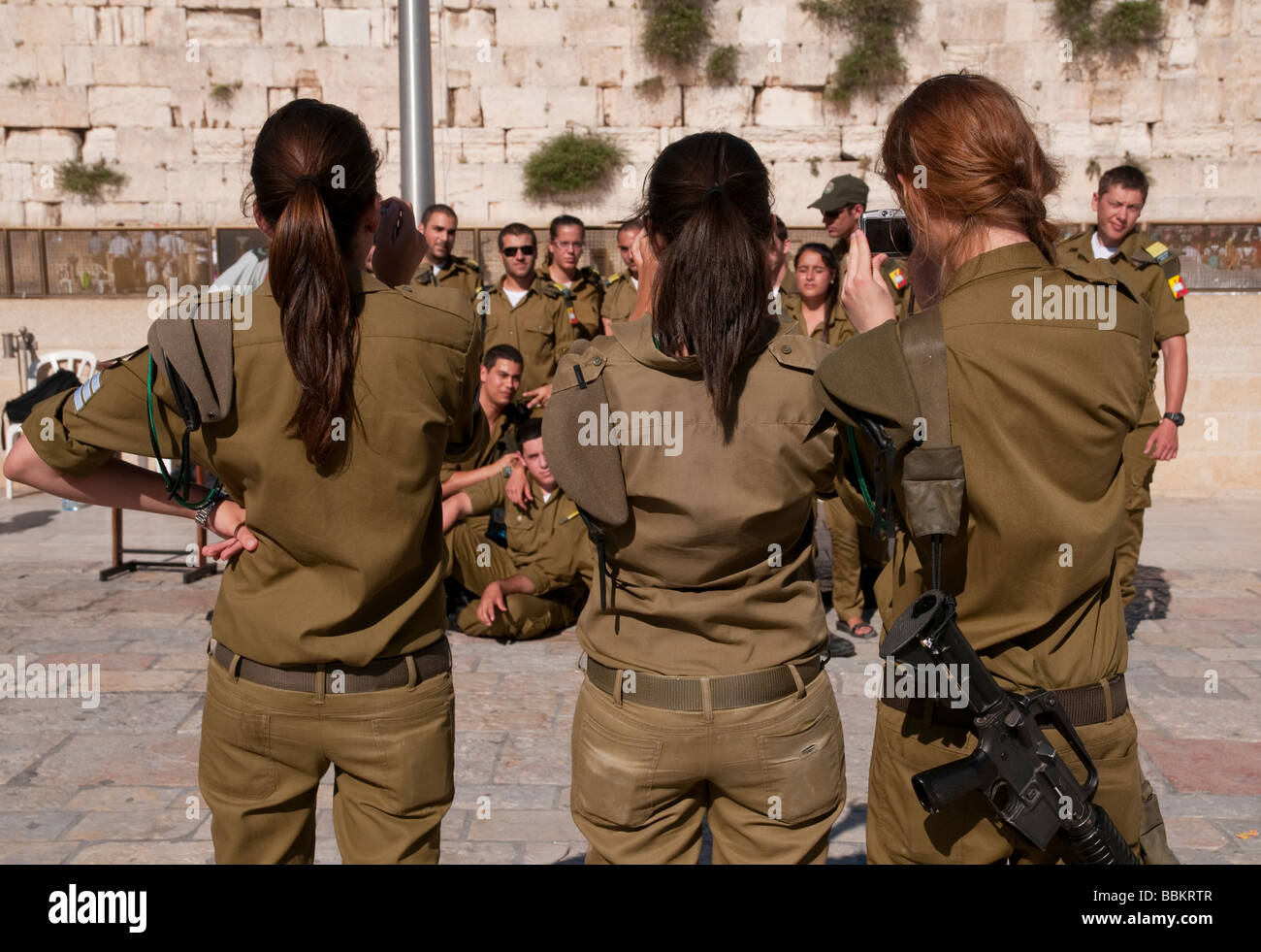 Israel Jerusalem Old City Western Wall group of soldiers pausing for picture Stock Photo