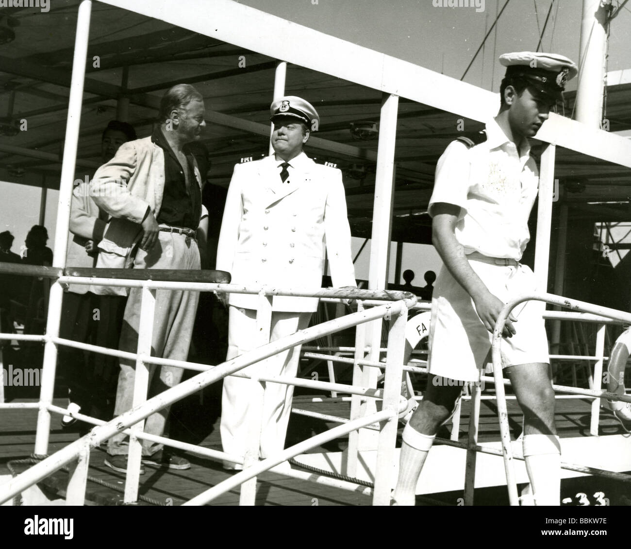 FERRY TO HONG KONG  1958 Rank film with Curt Jurgens at left next to Orson Welles Stock Photo