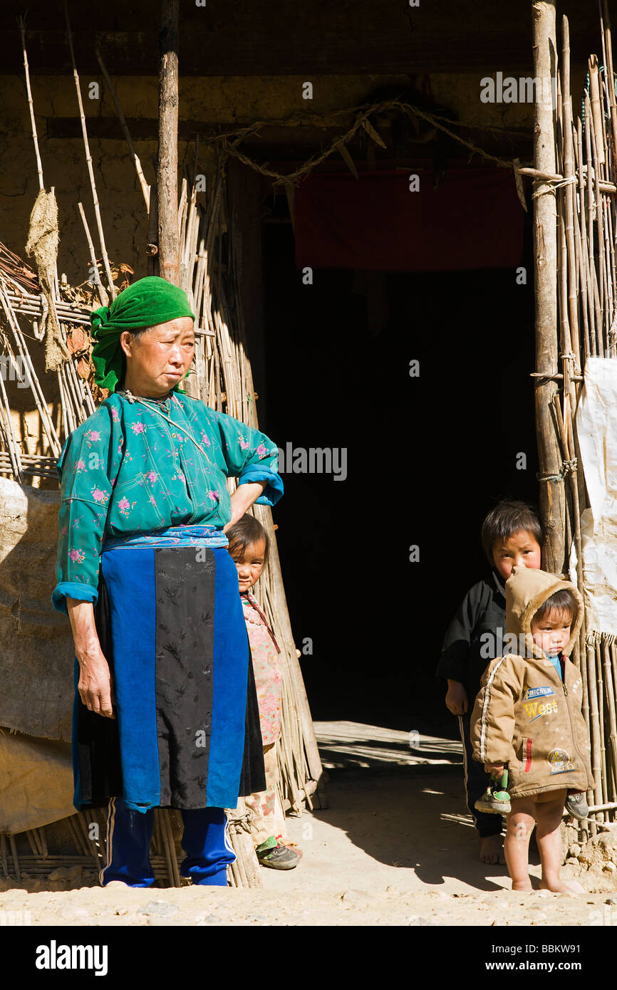 Blue Hmong woman and children in the north of Ha Giang Province near Sung La village, Northern Vietnam Stock Photo