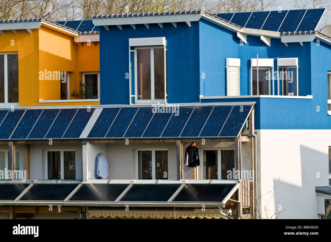 Colourful front with solar modules on a residential house, Freiburg