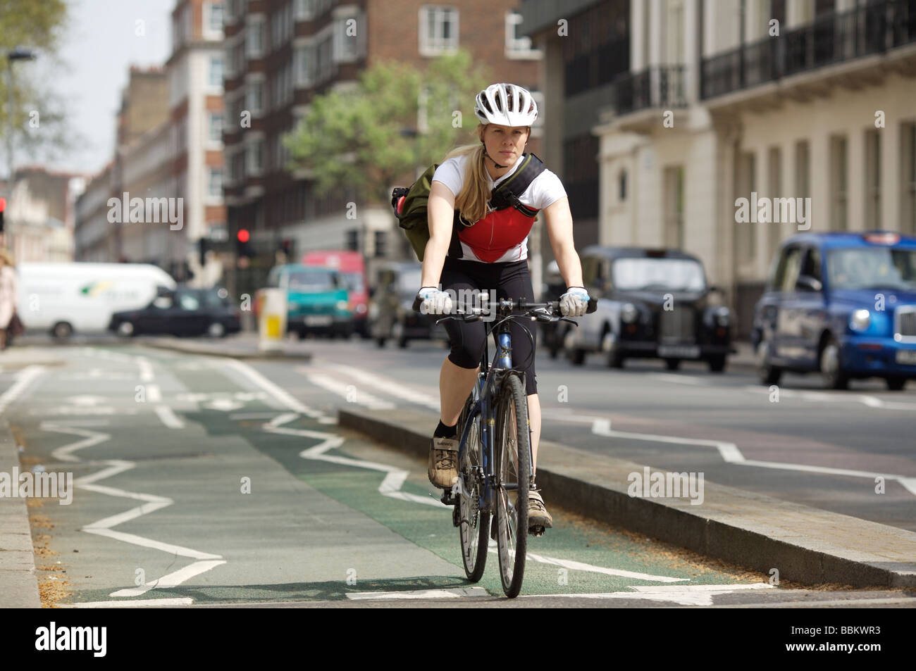 Young Woman Riding Bicycle to Work Stock Photo Alamy