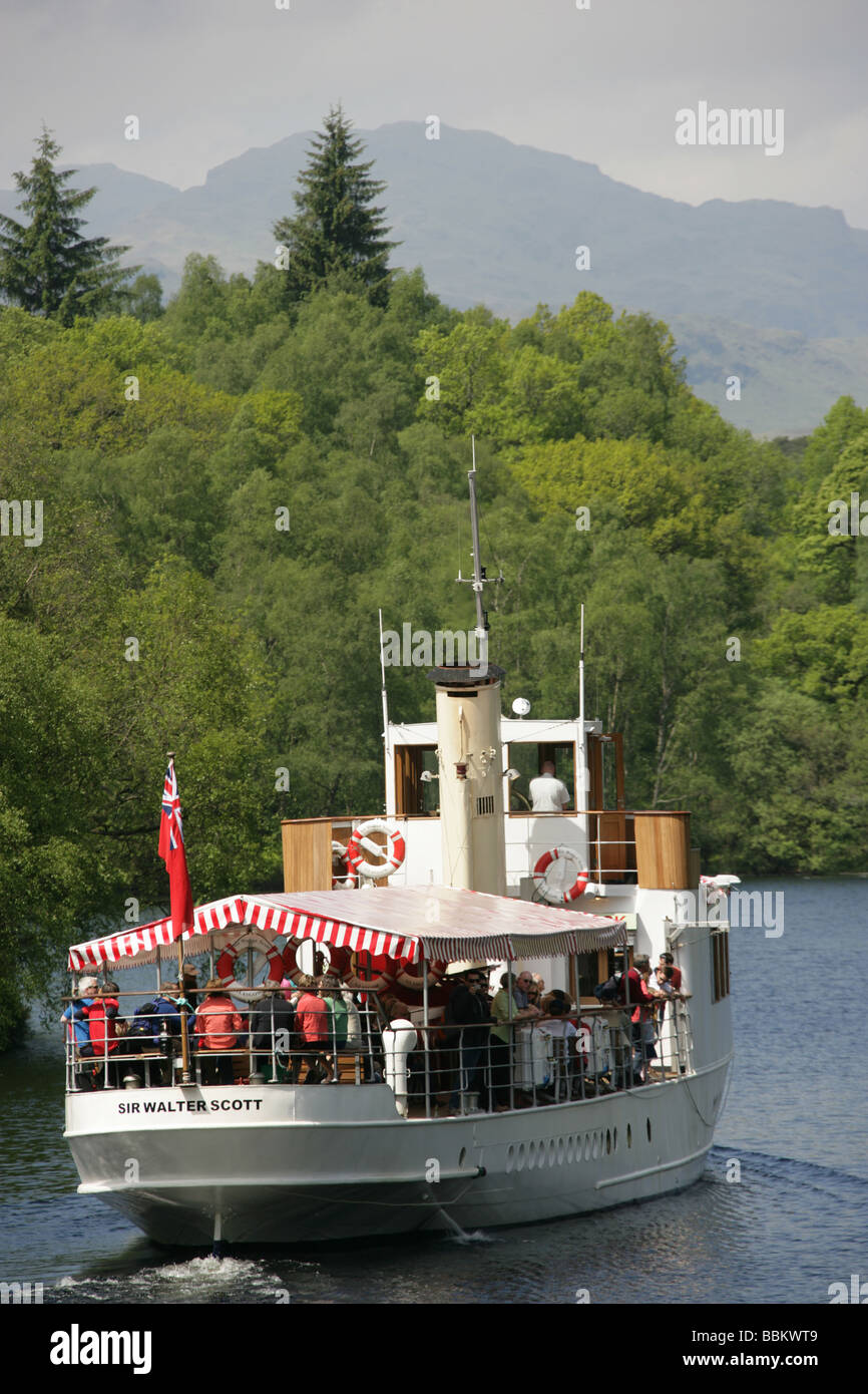 Loch Katrine, Scotland. The pleasure steamer SS Sir Walter Scott leaving Trossachs Pier for a sightseeing trip on Loch Katrine. Stock Photo