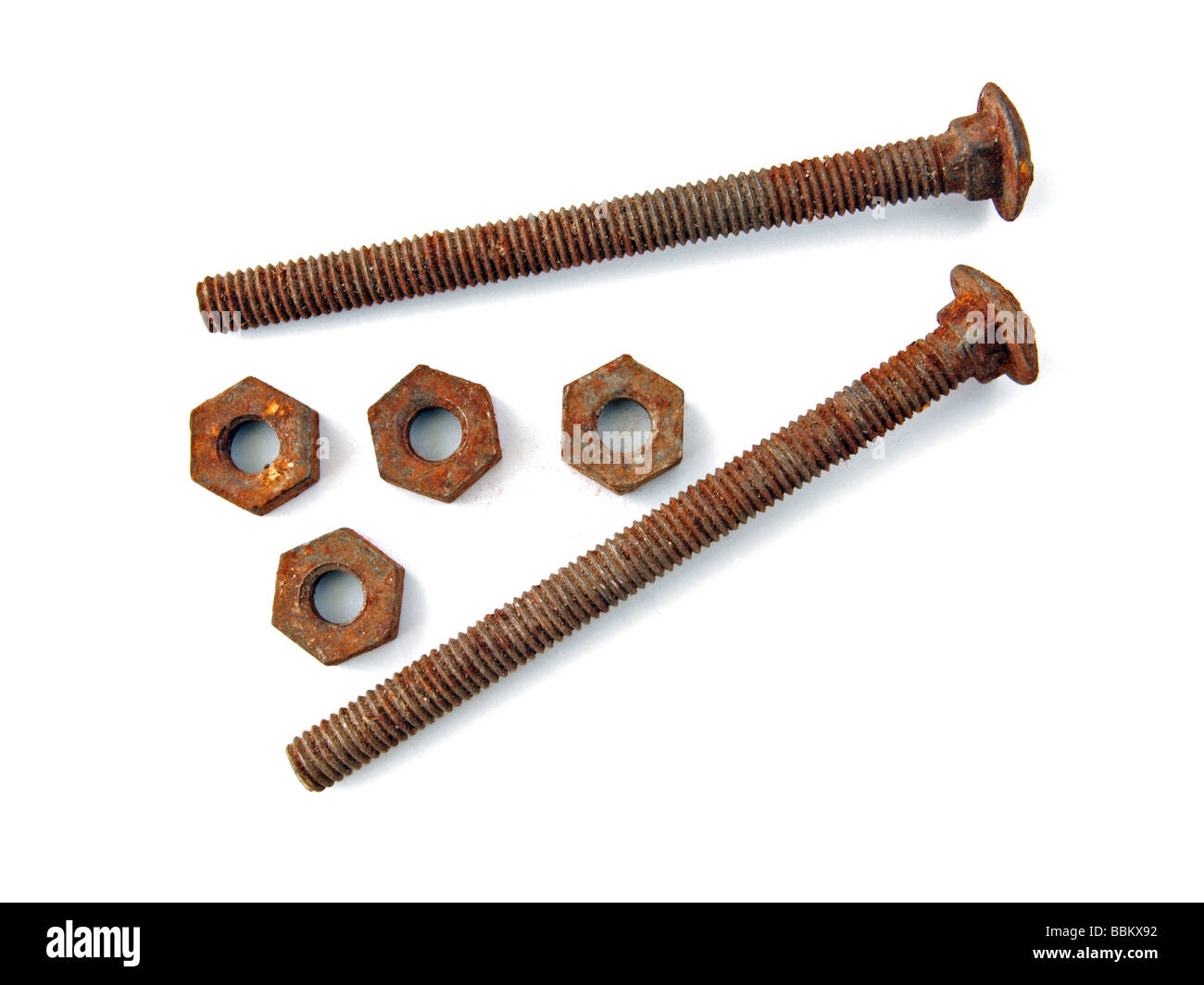 Two rusty bolts with four old nuts Stock Photo Alamy