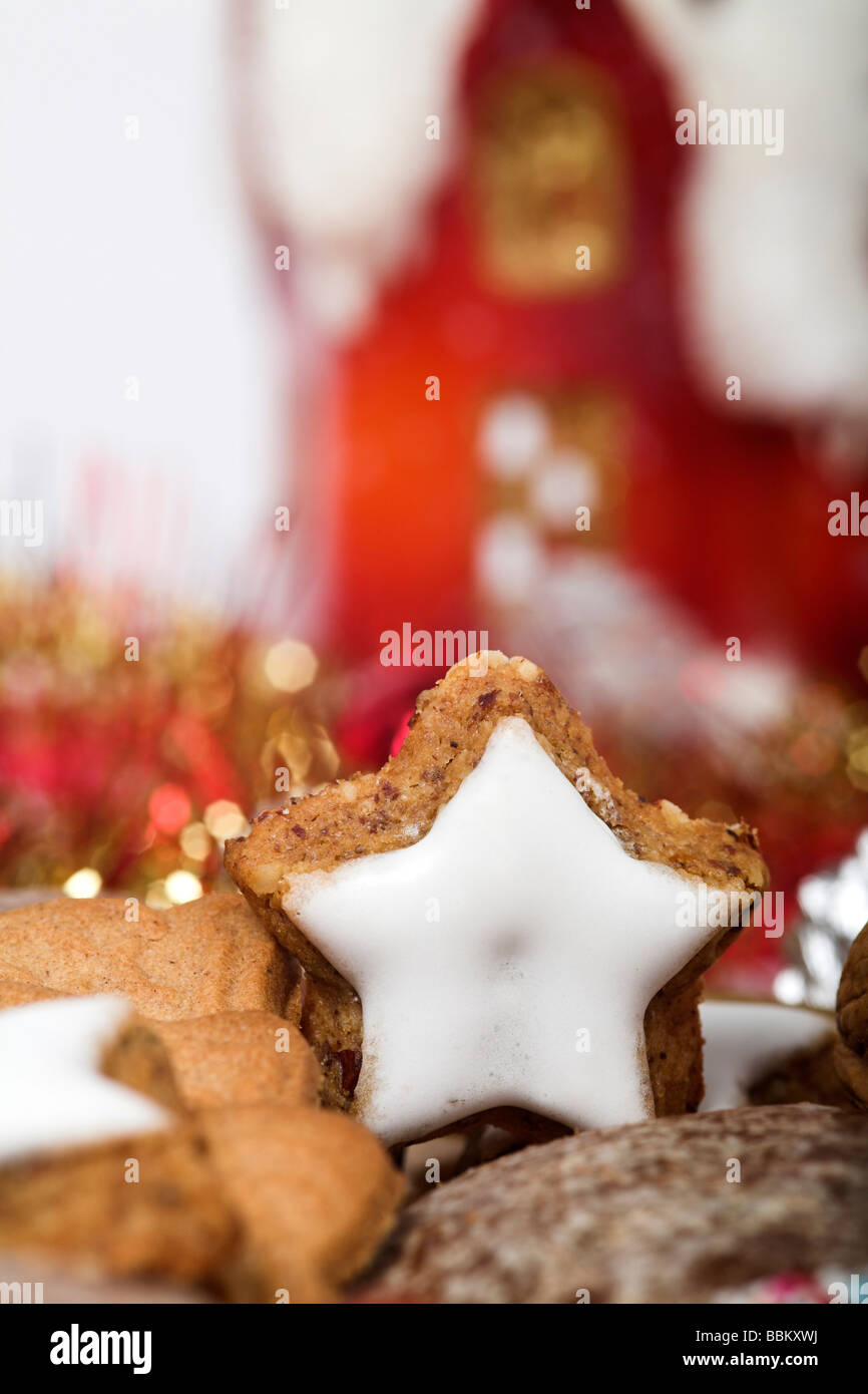Star-shaped cinnamon biscuit on Christmas cookies with Christmas decoration Stock Photo
