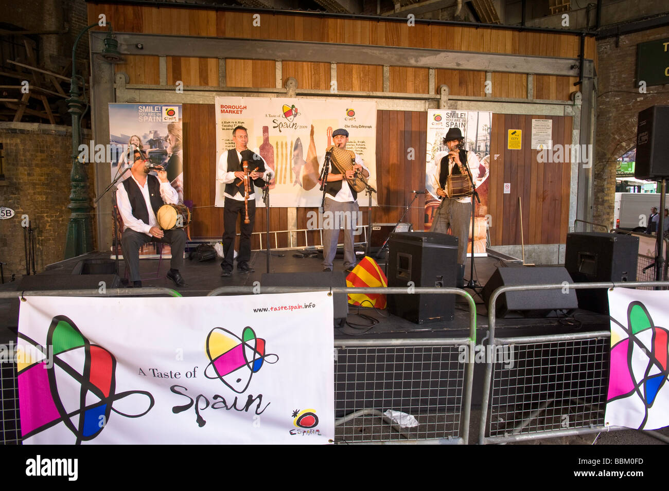 Traditional folk band performs during festival 'Taste of Spain' in Borough Market SE1 London United Kingdom Stock Photo