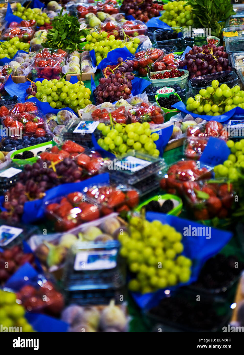 Punnets of assorted fruit for sale.  Photo by Gordon Scammell Stock Photo