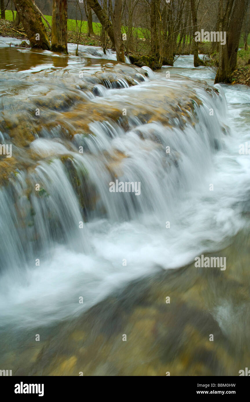 Mountain stream in spring, after snowmelt, Swabian Alb, Baden-Wuerttemberg, Germany, Europe Stock Photo