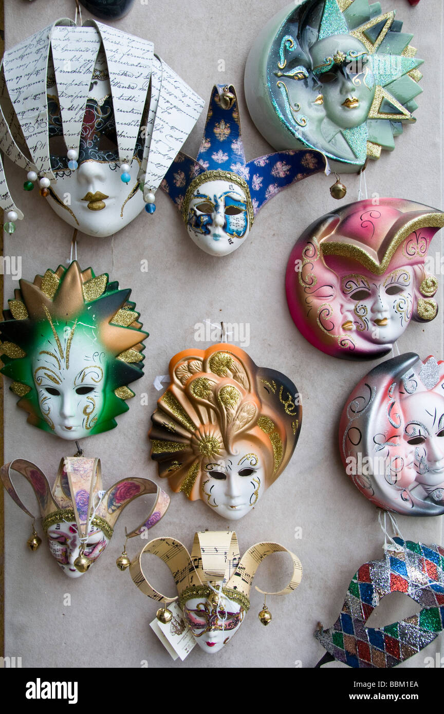 Face masks outside a souvenier shop window Murano Venice Italy Stock Photo