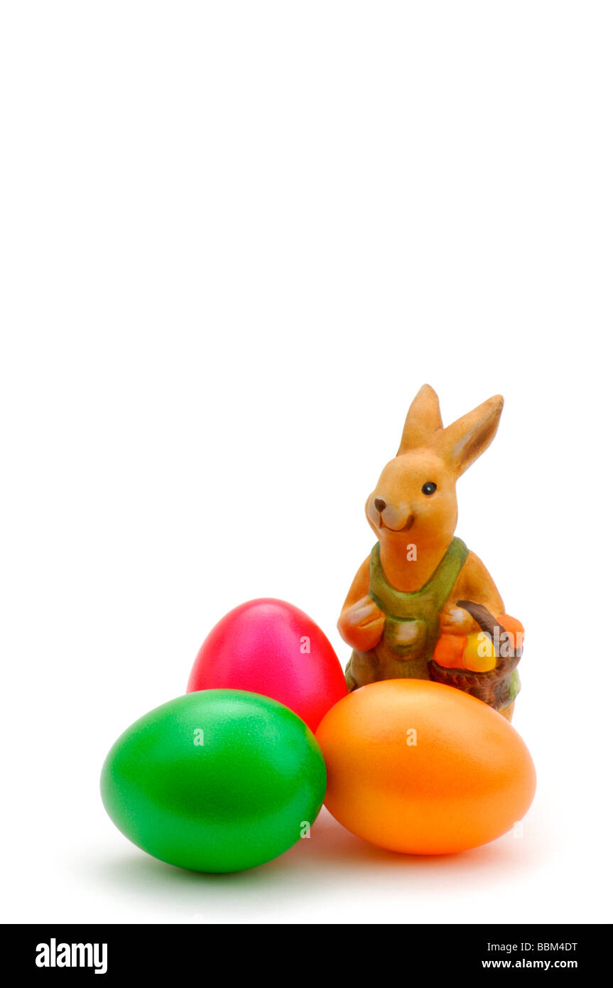 Coloured Easter eggs and a porcelain Easter bunny, Easter Stock Photo