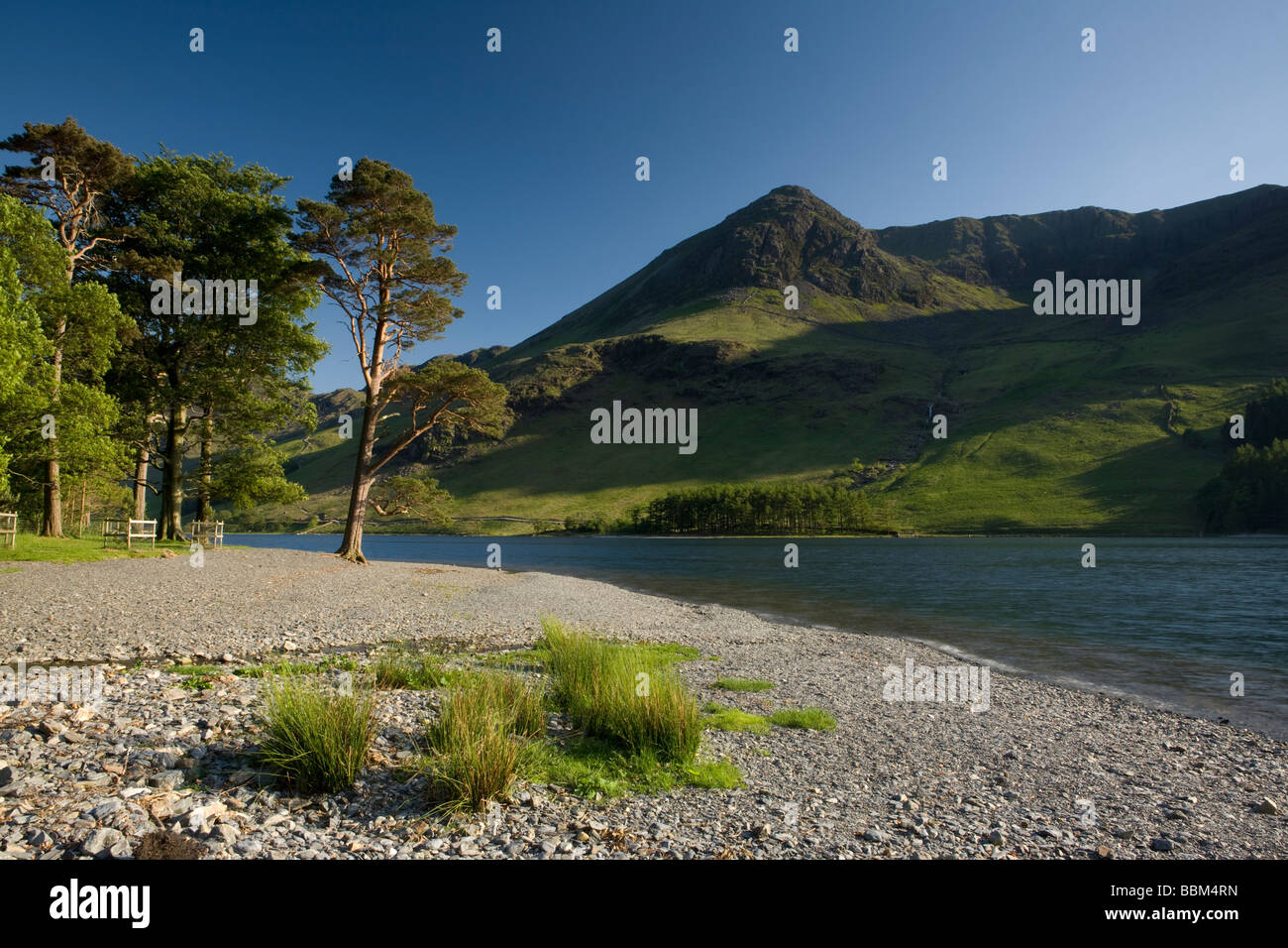Low water levels in the lake at Buttermere during the summer. Lake District National Park, England Stock Photo