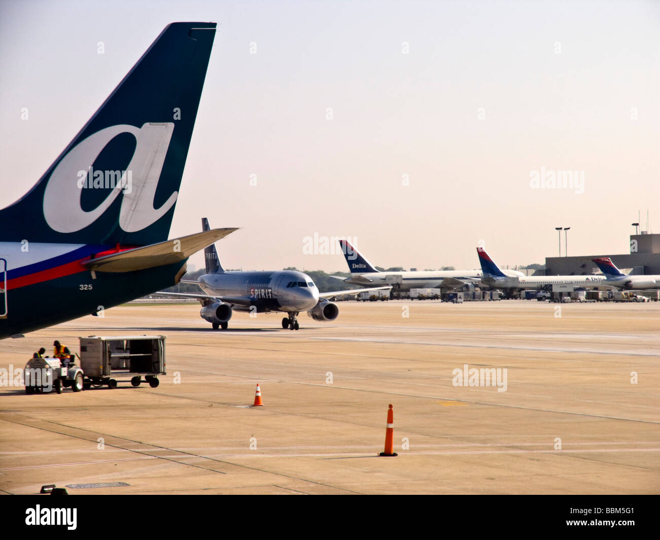 Commercial Aviation, airlines on ground at airport. Stock Photo