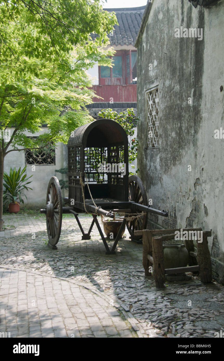 Old cart in back street of the ancient water town Zhouzhuang Jiangsu China Stock Photo