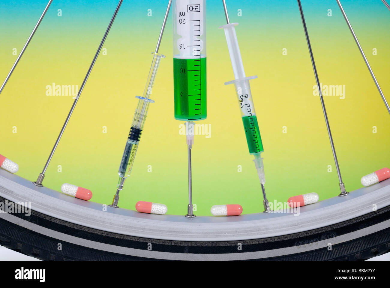 Injection needles in the spokes of a racing cycle tyre, symbolic picture for doping in cycling Stock Photo