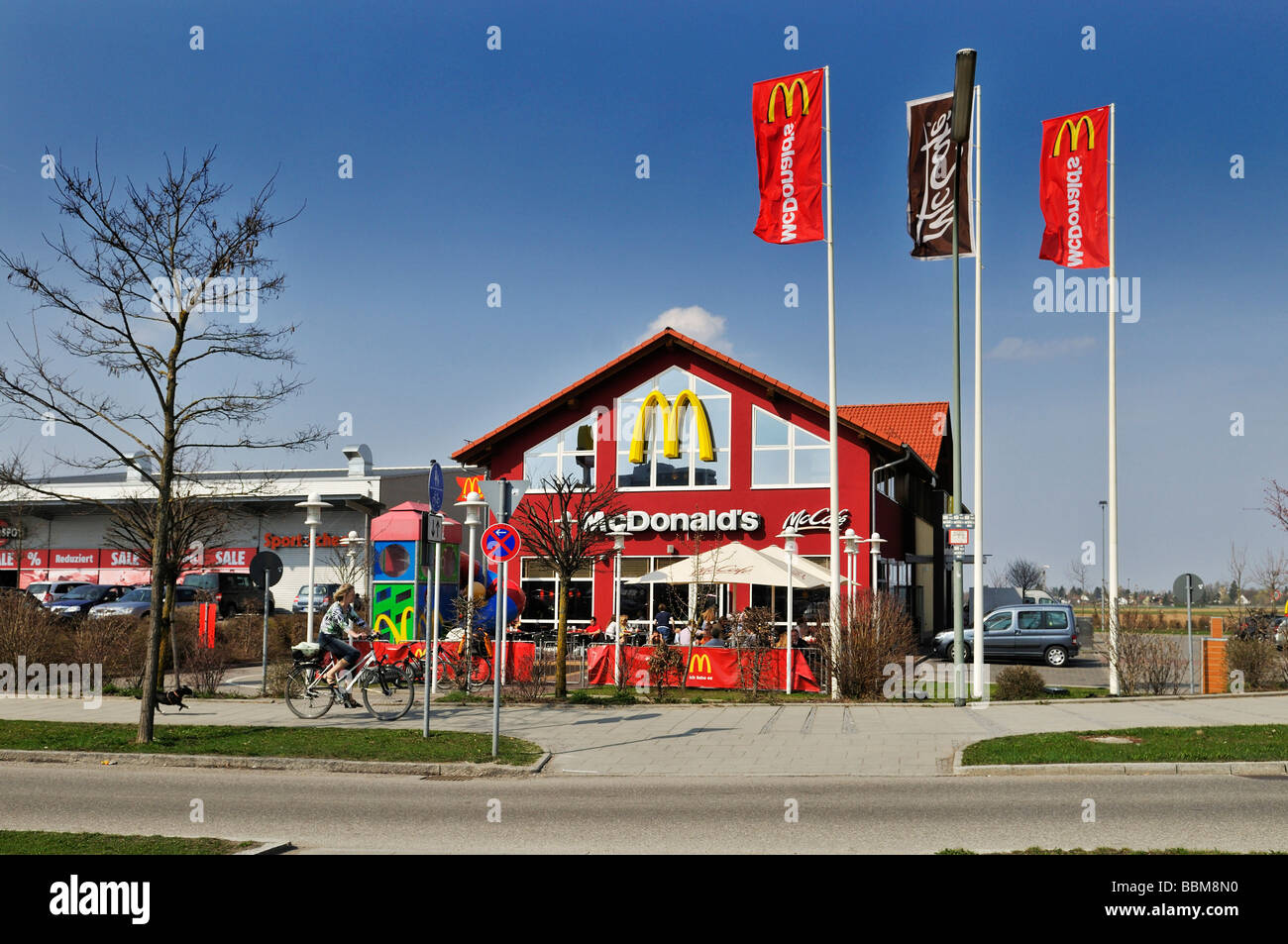 Mc Donald's Mc Cafe, flags, Munich, Bavaria, Germany, Europe Stock Photo